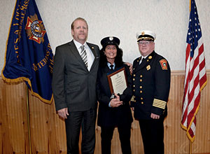 (L to R) Firefighters Local 76 President Tom Ross, Firefighter Christine Guelpa and Chief Kevin Kelleher. – Photo courtesy of Somerville Fire Department