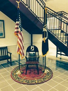 A chair commemorating military service members who are missing in action or have been taken as prisoners of war will be installed in City Hall Friday, Nov. 8 at noon.