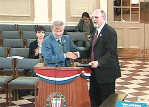 Alderman at Large Connolly presented outgoing Ward 7 Alderman Trane with his special citation, after which the honoree shared his admiration and affection for the members of the Board and the constituents he served.