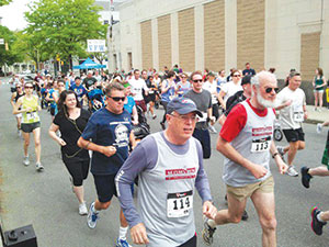 The annual M.O.M.’s Run 5k Run/Walk for Cancer raises funds for cancer research.
