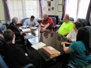 Starting with the gentleman with the red shirt and moving clockwise around the table: SEIU 888 members Joe Lyons, Sylvie Matignetti, Ed Grandmount and Mary White; SEIU 888 Representative Madeline Garcia; City Assistant Director of Personnel Candace Cooper; City Director of Personnel Bill Roche; City Chief Labor Counsel Robert Collins; and Mayor Joseph A. Curtatone.   