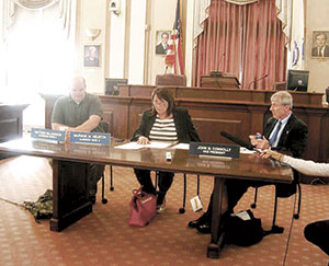 Members of the Somerville Board of Alderman joined with members of the Rodent Taskforce to examine plans and procedures that will be put into effect to try to stem the tide of rat infestation in the city. ~Photo by Douglas Yu