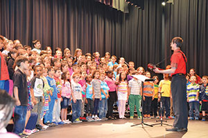 East Somerville Community School music teacher Adam N. Epstein is especially dedicated to bringing out the talents of his students. ~Photo by Claudia Ferro 