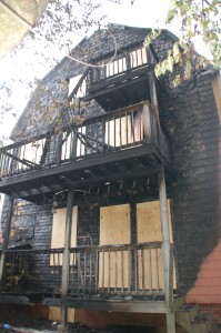 Heavy fire damage is evident in the rear of 53 Josephine Avenue. 