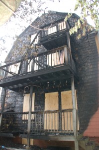 Heavy fire damage is evident in the rear of 53 Josephine Avenue.