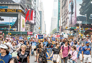 Hundreds of thousands of demonstrators gathered in New York City last Sunday for the People’s Climate March. ~Photos by Shadia Fayne Wood/Survival Media Agency