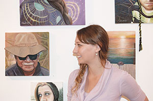 Artist Danielle Festa exhibited her unique “selfie” series of paintings that features textural materials that add a touch of realism to her work at the See Art, Talk Art, Be Art event at Washington St. last weekend. ~Photos by Douglas Yu