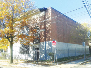 The unused building at the corner of Avon and School Streets sustained serious damage to its roof during last week’s patch of rough weather. ~Photos by Donald Norton