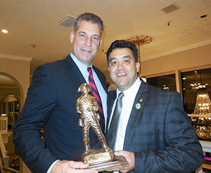 Middlesex County Sheriff Peter J. Koutoujian (Left) poses with friend Wor. Philip J. Privitera (Right) after Privitera was presented with the award for two terms as Middlesex County Bar Association President 2012-2014.