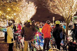 Residents and visitors to trolleys and bicycles this weekend to soak up the illuminated atmosphere of the city’s festively decorated neighborhoods this year’s Illuminations Tour kicked off.~Photo by Douglas Yu