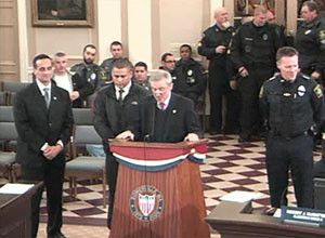 Somerville Police Sgt. Sergio Costa receiving citation from the city.