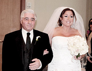 Victor Moccia walks his daughter Nancy down the aisle.
