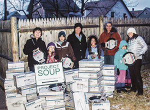 Marla Wessland and friends Maren Chiu and Alison Mitchell, with their children, deliver Cuisinart pots and pans from the Star Market/Shaw's promotion, to the Project SOUP food pantry. Over 100 people collected 12,000+ coupons which resulted in 120 items donated.