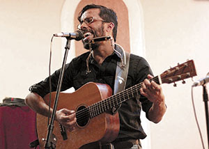 Prateek Poddar is but one of the semi-regular singer/songwriters who grace the stage at Arts at the Armory’s “The Loop” event. ~Photos by Anastasia Markov