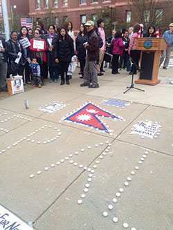 Attendees of last week’s vigil in support of Nepal earthquake victims stood in solidarity as they remembered those who lost their lives as well as those recovering from the devastation. ~Photo by Douglas Yu