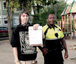 Austin with Teen Empowerment and  Officer Steve St. Hilaire. 