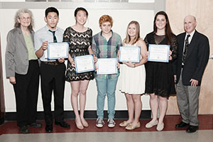Erica Voolich and Jay Lander congratulate Elliot Rippe, Connie Chan, Jenni Matthews, Briana Lino and Emily Kate O’Brien on winning Somerville Math Fund renewable scholarships for outstanding work in math & science.
