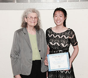 Erica Voolich congratulates Connie Chan on winning the Dr. Alice T Schafer Scholarship from the Somerville Math fund.