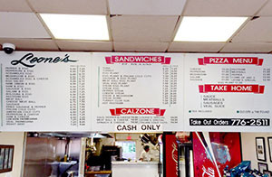 The menu board at Leone’s has gone from analog (here) to digital (below), but however you slice it, it’s still the best sub and pizza shop in Winter Hill.