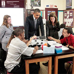 Skipper with President Obama, checking out some of the latest technological innovations in the classroom.
