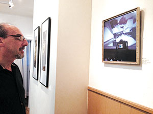 Somerville Toy Camera Festival co-organizer James Zall at the Nave Gallery Annex last Thursday. ~Photos by Josie Grove 