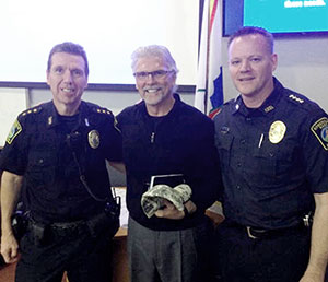 Deputy Chief Stephen Carrabino, left, and Chief David Fallon, right, work with retired south Carolina Police Chief Dean Crisp, lead instructor for the FBI-LEEDA Supervisor Leadership Institute, at the Somerville Police Department's headquarters last week. (Courtesy Photo)