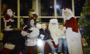 Kaylie Burke,  Aedan Burke  and Bobby Foley Jr. are seen here visiting with Santa and Mrs. Claus.