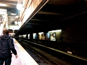 The scene at a nearly empty Davis Sq. T station last Friday night. ~Photo by Josie Grove
