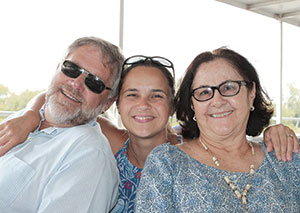 Daniela Abbott (center), with her parents Marcia and Jeffrey Hansen.