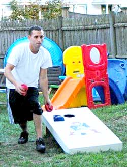 Ryan Harrington playing corn toss.