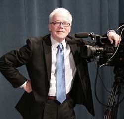 Debate moderator Joe Lynch.