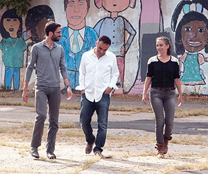 Powderhouse Studios founder and director Alec Resnick (left) with Founder and staff member Bakhtiar Mikhak (center) and Director of Operations and Co-Founder Shaunalynn Duffy (right) discussing the new “Super School” coming to Somerville.