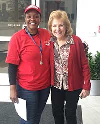 Doresta McIntosh (left) was one of 46 volunteers who stepped-up to make Meals on Wheels deliveries for Somerville-Cambridge Elder Services the morning of Thanksgiving. The volunteers allowed most regular drivers to have the day off, but McIntosh volunteered to come in and do her regular route on the holiday. She’s seen here with SCES Community Meals Program Director Deborah McLean.