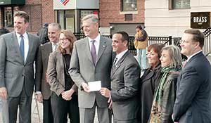 Massachusetts Governor Charlie Baker presented Somerville Mayor Joseph Curtatone with a 13M MassWorks Infrastructure grant for Union Square last week.