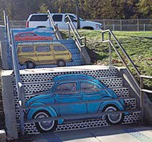 “The Souls Journey as A Series of Weird Old Cars” street mural by Liz LaManche.